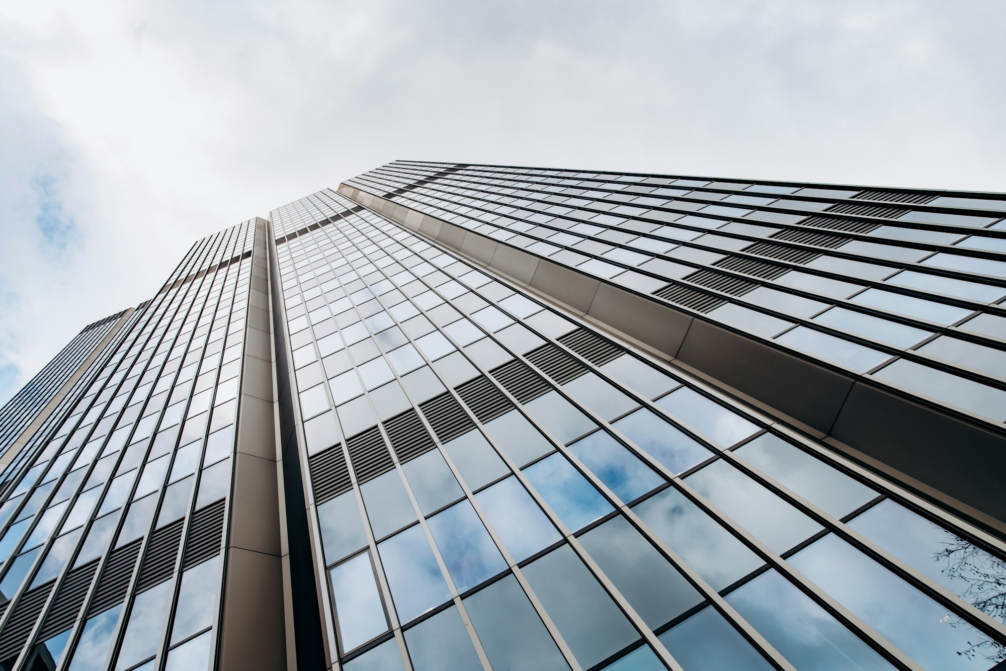 Blue skyscraper facade. office buildings. modern glass silhouettes