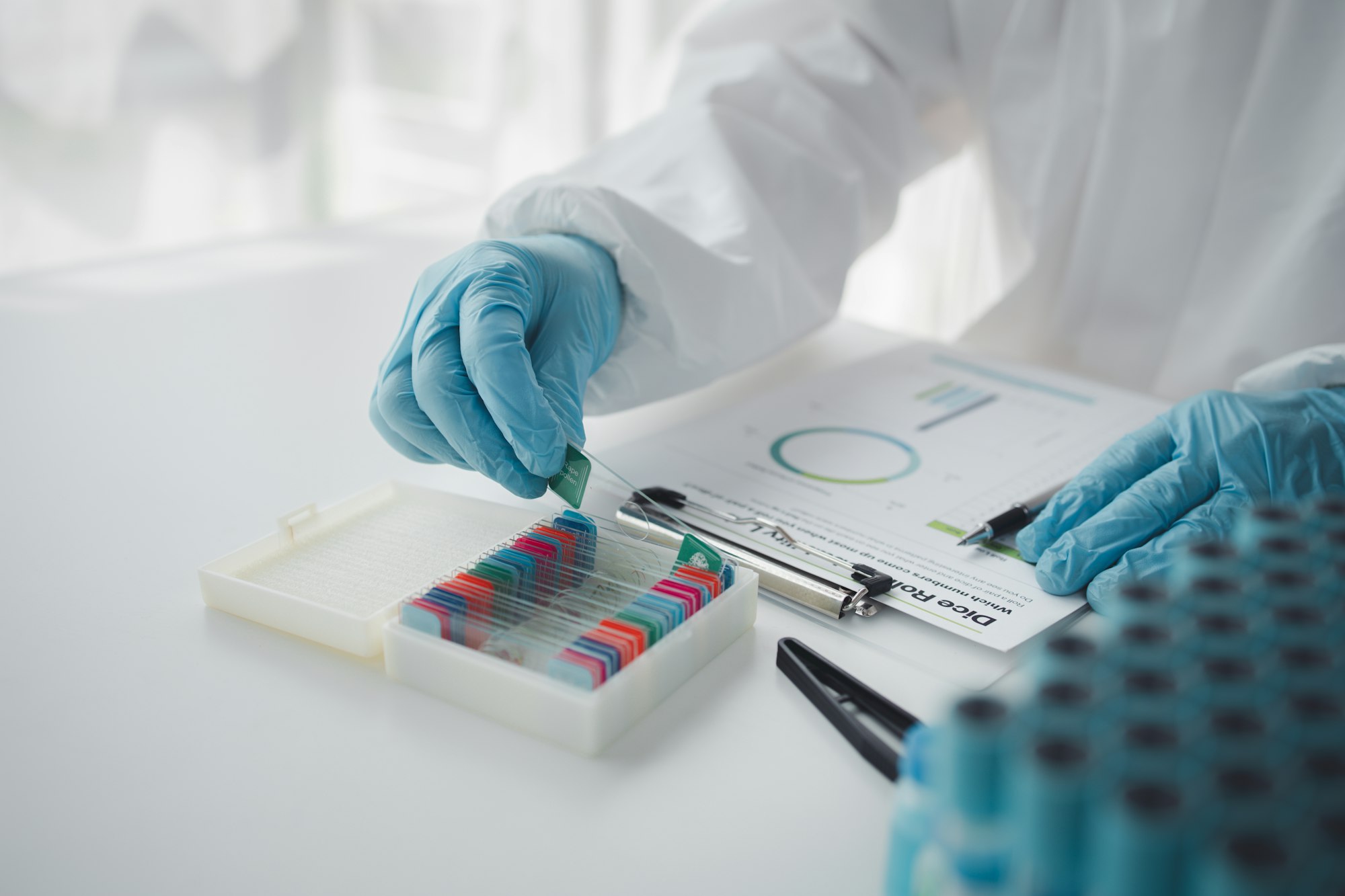 Lab practitioner working on chemical research for chemical reactions, does a chemical experiment and